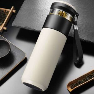 White and black insulated travel thermos mug